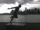 Vancouver Skyline and Runner Statue