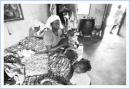 Woman beneficiary