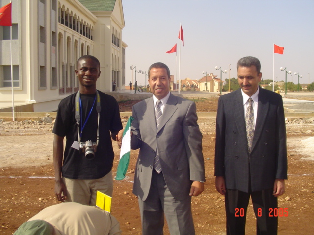 Hauwa Umar and Rotimi Olawale planting a tree with a Governor in Morocco