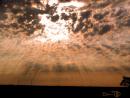 The Clouds Rrain at Sunset