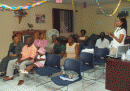 COMMUNITY MEMBERS ATTEND THE HEALTH LECTURE AT URBAN RENEWAL CENTRE