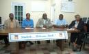 The Hon. Brensil Rolle (centre), Parliamentary Secretary in the Ministry Housing and National Insurance officially re-opened the After School Programme at the Bain and Grants Town Urban Renewal Center on Baillou Hill Road and Cameron Street, on Monday, Oc