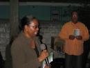 Ms. Ella Lewis; Coordinator of the Urban Renewal Program - addresses the North Eastern Pastors' Alliance Pre-Christmas Celebration - held at Georgiana K. Symonette Park, East Shirley St. - December 06, 2008.  In the background is Pastor Dale Moss of the C