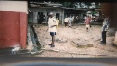 A participant spraying insecticide at Princes Christian Maternity Hospital