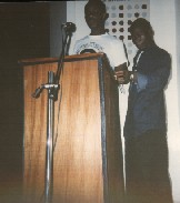 NYMCOS member, making a statement at British Council