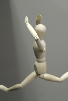 Wooden puppet in motion